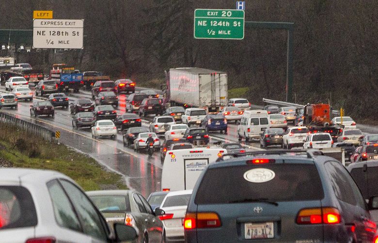 Traffic and gloomy weather are among the negatives cited by departing King County residents. Pictured is I-405 in January 2016. (Mike Siegel / The Seattle Times)