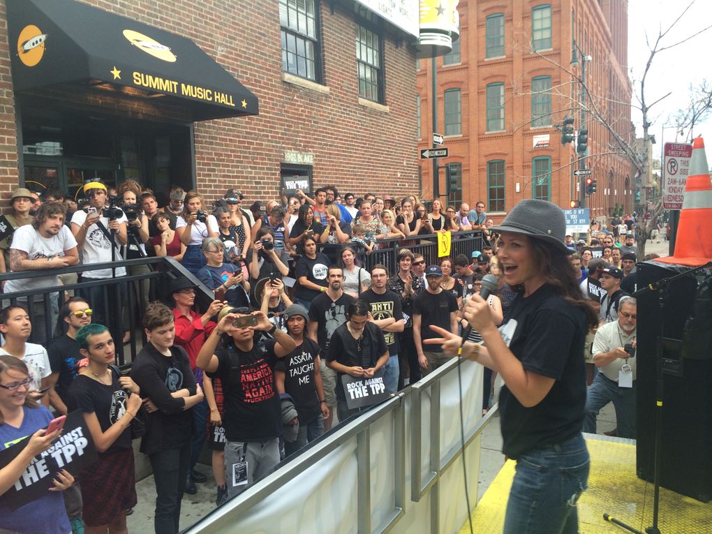 Canadian actor Evangeline Lilly speaks to the crowd in July before the “Rock Against the TPP” kickoff concert in Denver. (Courtesy of “Rock Against the TPP”)