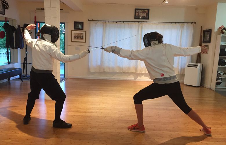 Fencing. (Nick Sullivan / The Seattle Times)