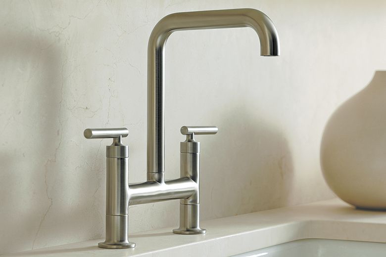 bridge faucet with angled spout        
        <figure class=