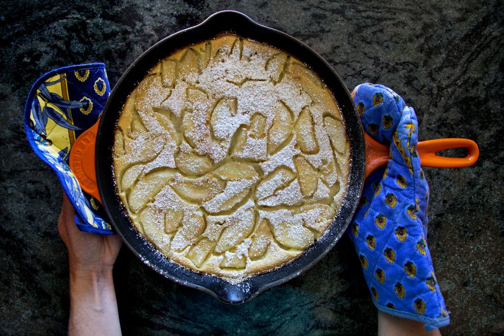 Pear clafoutis dusted with powdered sugar. (Johnny Andrews/The Seattle Times)