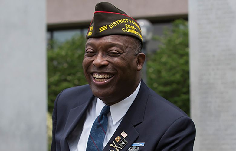 Archie Elam, who recently graduated from Encore!Hartford, a four-month training program for corporate professionals over age 50, at the Veteran’s memorial in Stamford, Conn. (Lisa Wiltse / The New York Times)