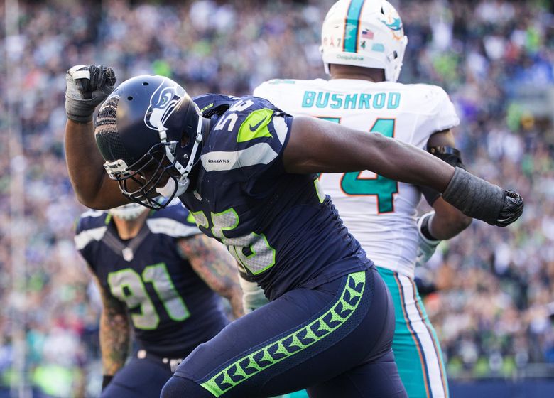 Jimmy Graham, Thomas Rawls return to Seahawks with limited roles in win  over Dolphins