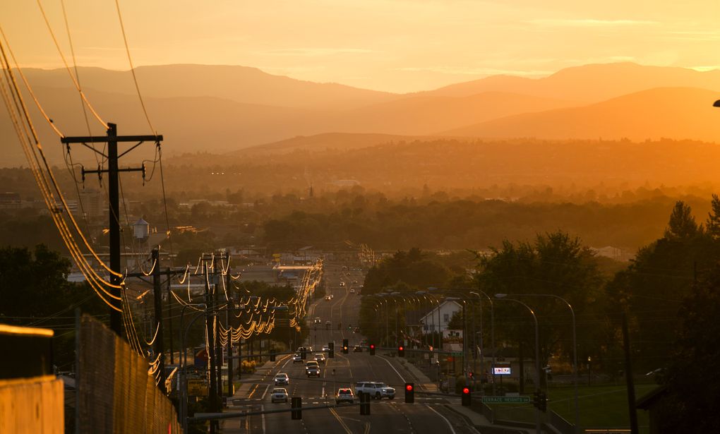 The sun sets over Yakima. In Yakima County, roughly half of the residents are Hispanic, up from less than a quarter in 1990. (Bettina Hansen/The Seattle Times)