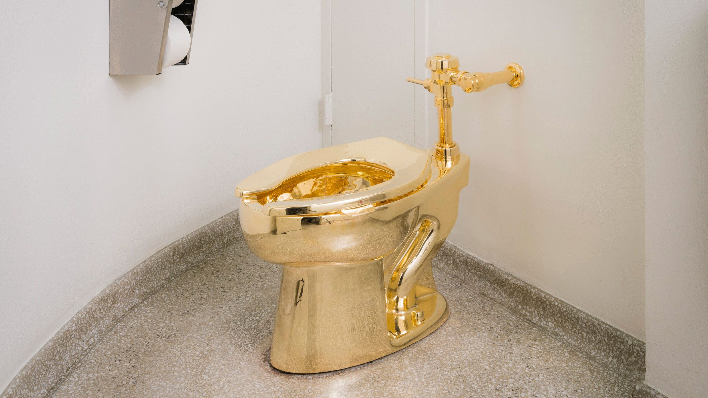 Golden toilet, fully functional, arrives at Guggenheim Museum