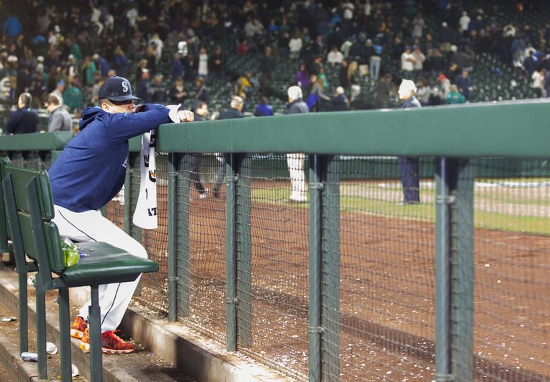 Seattle Mariners' Felix Hernandez walks to the dugout after the