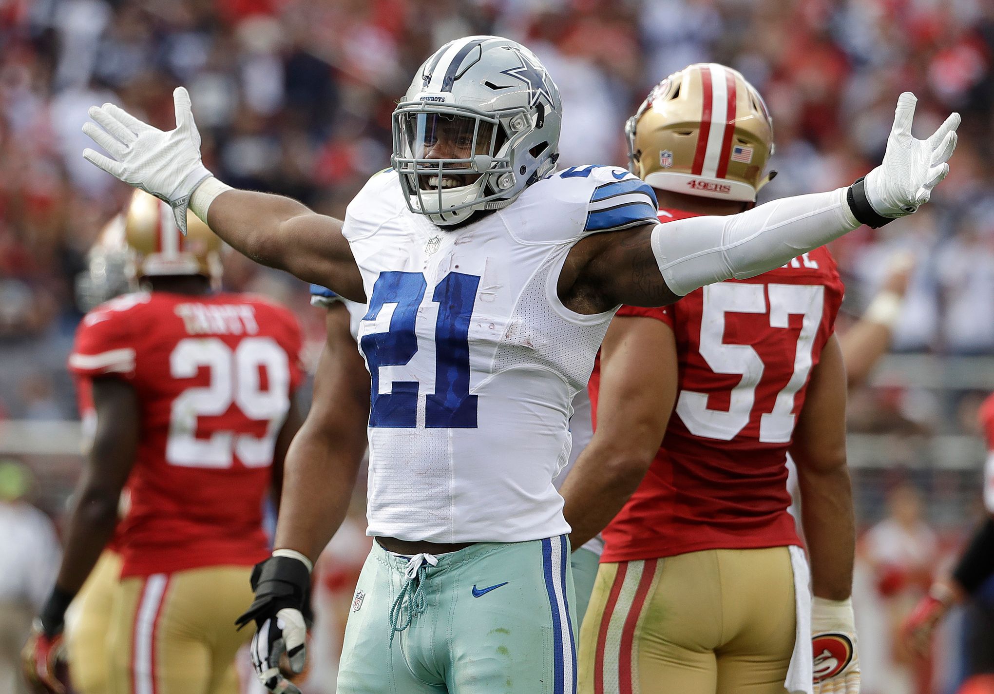 Injured Dallas Cowboys wide receiver Dez Bryant roams the sidelines during  an NFL football game against the San Francisco 49ers Sunday, Oct. 2, 2016,  in Santa Clara, CA. The Cowboys won 24-17. (