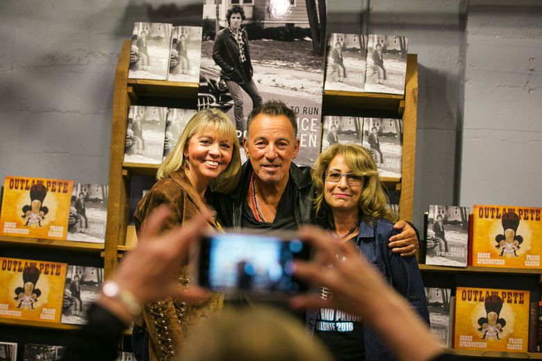 Bruce Springsteen greets fans at Elliott Bay Book Company. (Johnny Andrews/The Seattle Times)