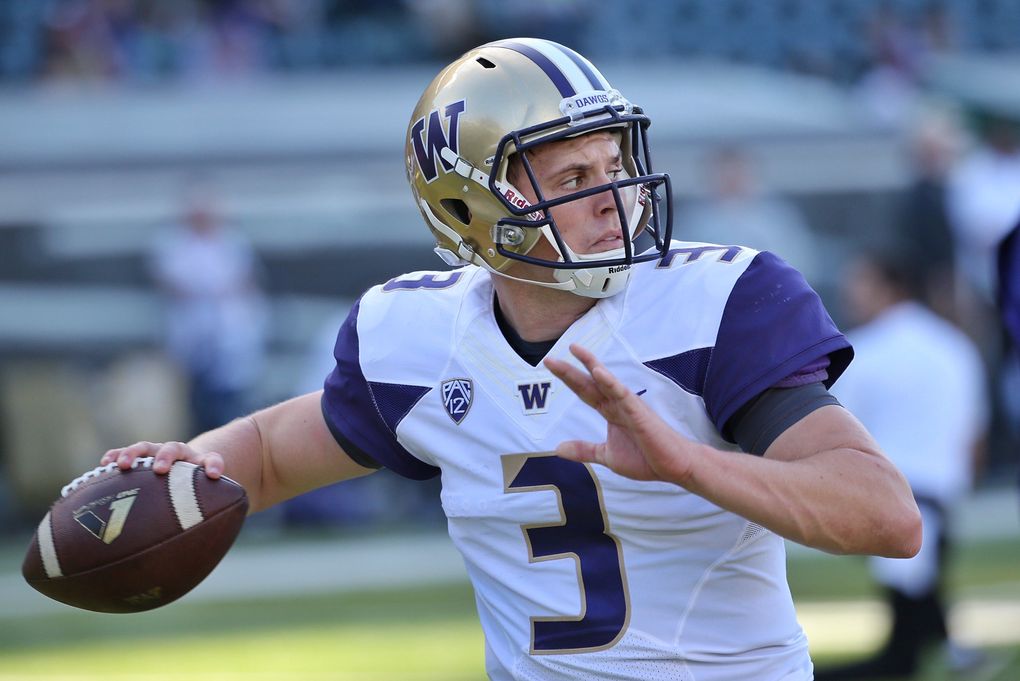 Huskies quarterback Jake Browning warms up before a game against Oregon in Eugene, Ore. , Oct. 8, 2016. (Johnny Andrews / The Seattle Time