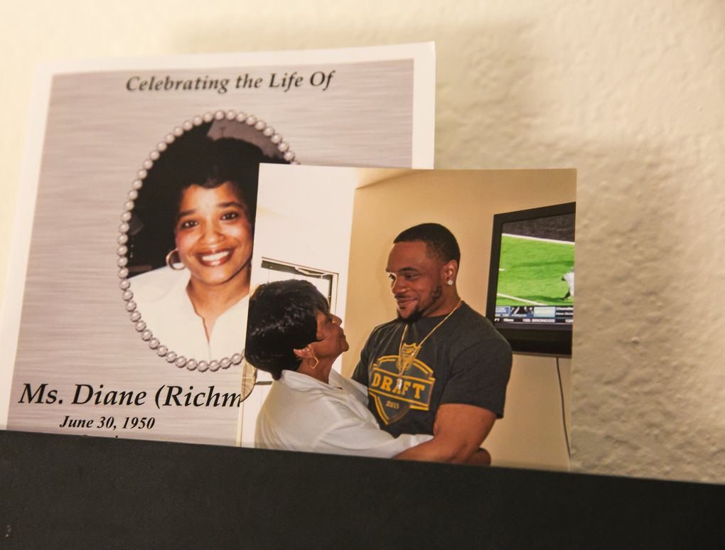 A photo of Thomas Rawls and “Granny” Diane Rawls, along with the program from her memorial service, hangs at mom Deadra Whitley’s house. Granny Rawls passed away in March of 2016, and she was very close with Thomas, or as they know him, Ty. (Bettina Hansen/The Seattle Times)