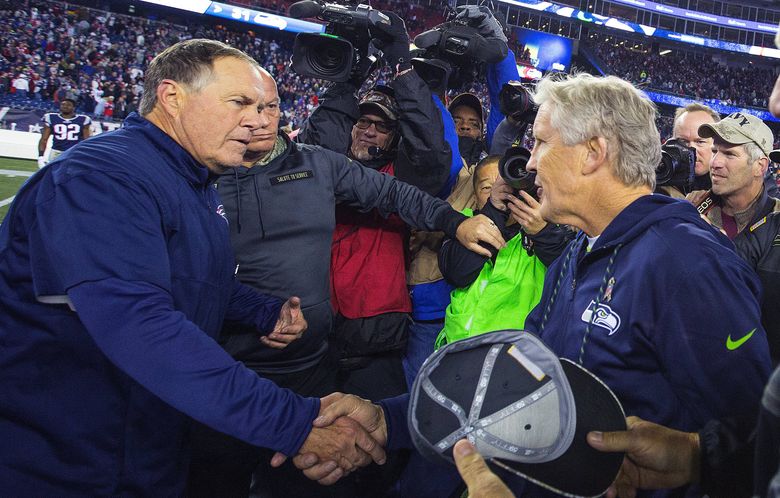 New England Patriots head coach Bill Belichick and Seattle Seahawks head coach Pete Carroll shake hands after the game at Gillette Stadium in Foxborough MA on Sunday November 13th, 2016.