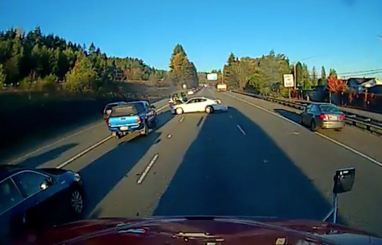 Dash-cam video shows car swerve in front of semi, strike dump truck ...