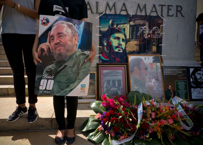 People with images of Fidel Castro gather one day after his death in Havana, Cuba, Saturday, Nov. 26, 2016. Cuba will observe nine days of mourning for the former president who ruled Cuba for half a century. (AP Photo/Ramon Espinosa)
