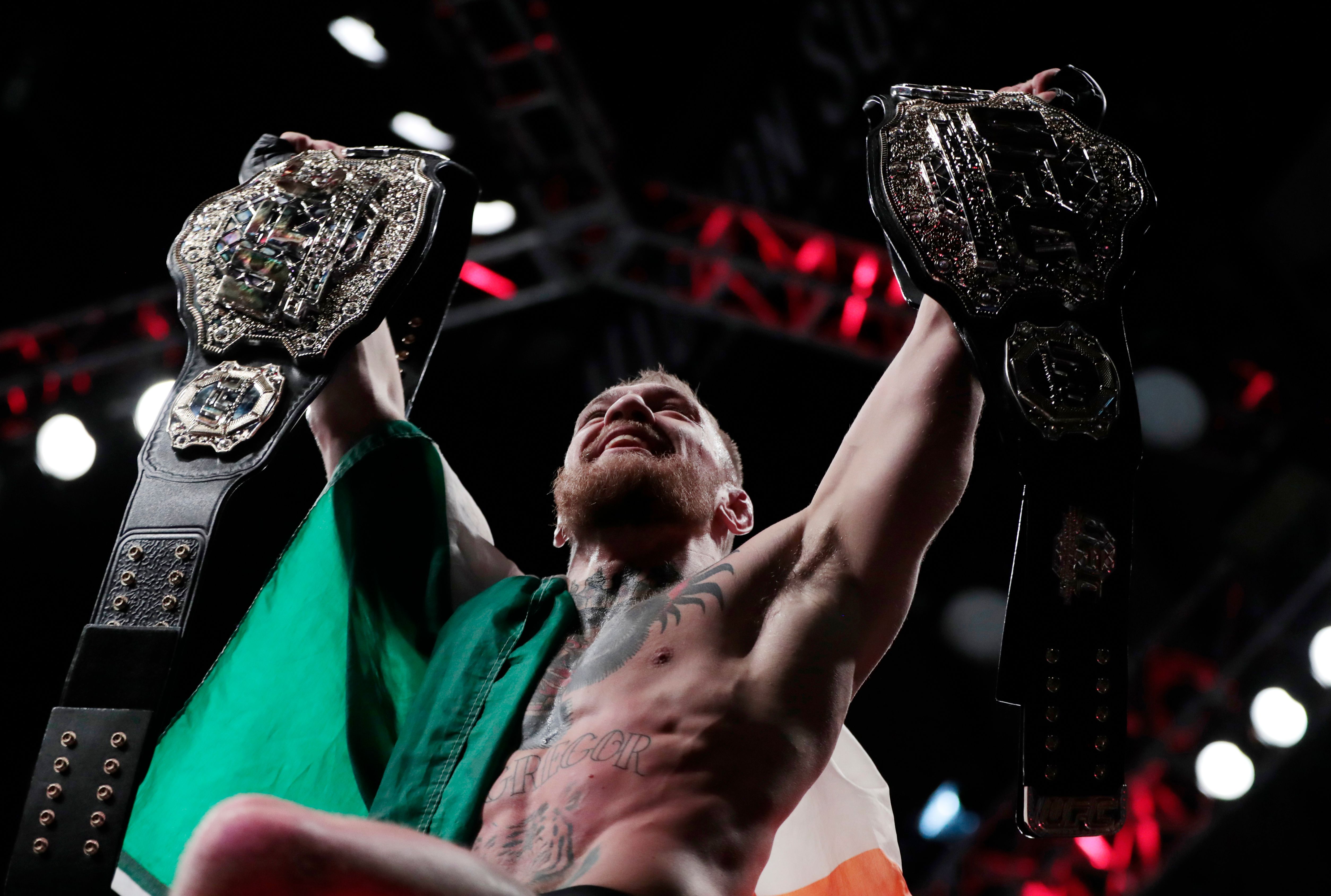 McGregor is UFC s first 2 division champ seeks equity stake The