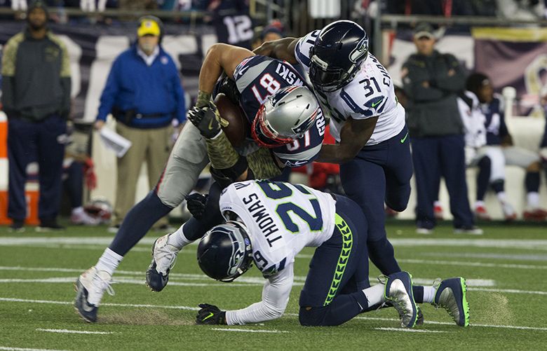 Seattle's Kam Chancellor wins battle with Rob Gronkowski on game-deciding  play