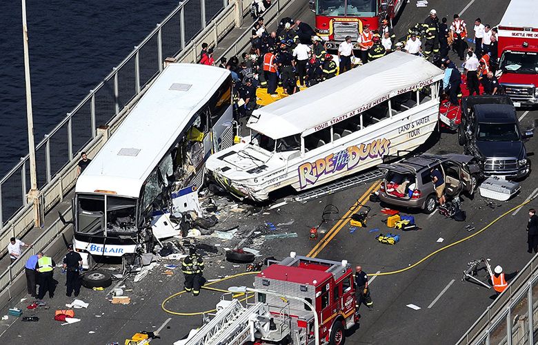 Ride the Ducks vehicle collides with charter bus on Aurora Bridge, Thurs., Sept. 24, 2015, in Seattle.