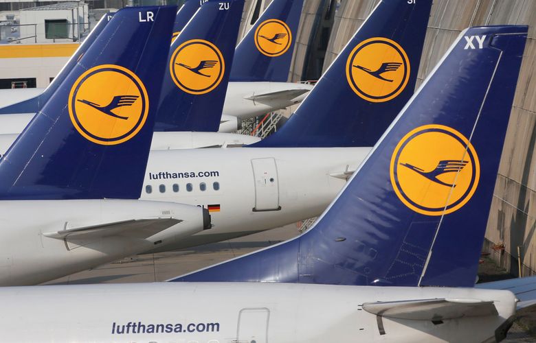FILE – In this April 2, 2014 file picture Lufthansa aircraft are parked as Lufthansa pilots went on a three-days-strike in Frankfurt, Germany. German airline Lufthansa says it’s going to cancel almost a third of all flights Wednesday because of a pilotsâ€™ strike. The Cockpit union announced Monday that pilots of all short- and long-haul flights out of Germany will go on strike in a dispute over pay. The airline said Tuesday  Nov. 22, 2016 that â€œdue to tomorrow’s strike 876 of 3,000 LH Group flights had to be cancelled.â€  (AP Photo/Michael Probst,file) MLH101