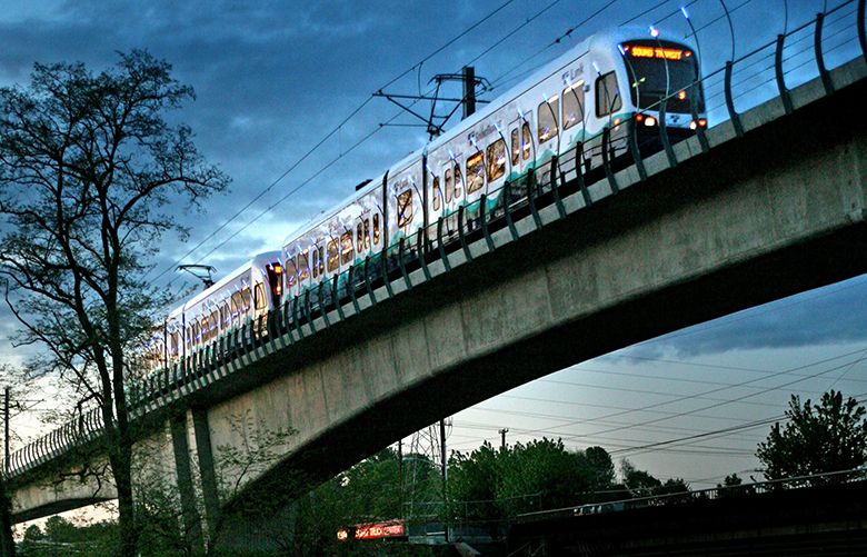 LINK LIGHT RAIL — SOUND TRANSIT — 05142009 — 94991A Sound Transit Link Light Rail heads towards Tukwila over the Duwamish River  in Tukwila south of S. Boeing Access Rd.Sound Transit Link Light  Rail trains pull into the Tukwila station during training sessions one recent night, when the trains were running from 7 p.m. – 1 a.m.