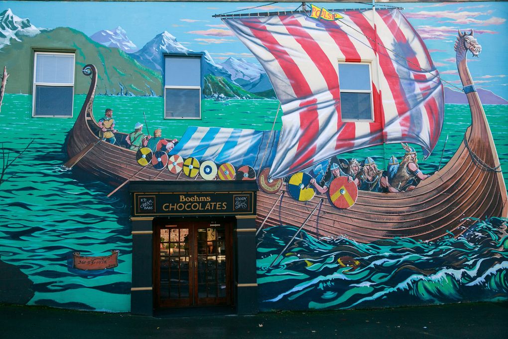 One entrance of the Boehm’s Chocolates shop blends into a mural reflecting Poulsbo’s Scandinavian heritage. (Erika Schultz/The Seattle Times)