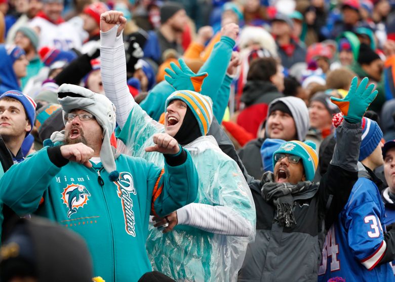 How did fans celebrate Christmas at Dolphins game? See what