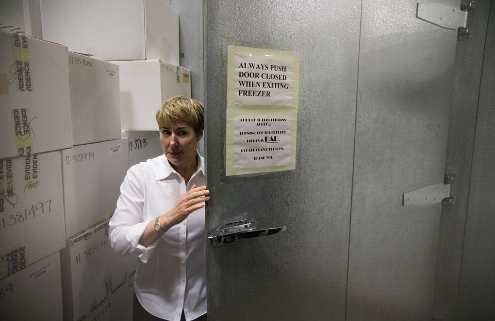 Seattle police Capt. Deanna Nollette, commander of the Special Victims Unit, leaves the freezer where hundreds of untested rape kits are stored. (Steve Ringman/The Seattle Times)