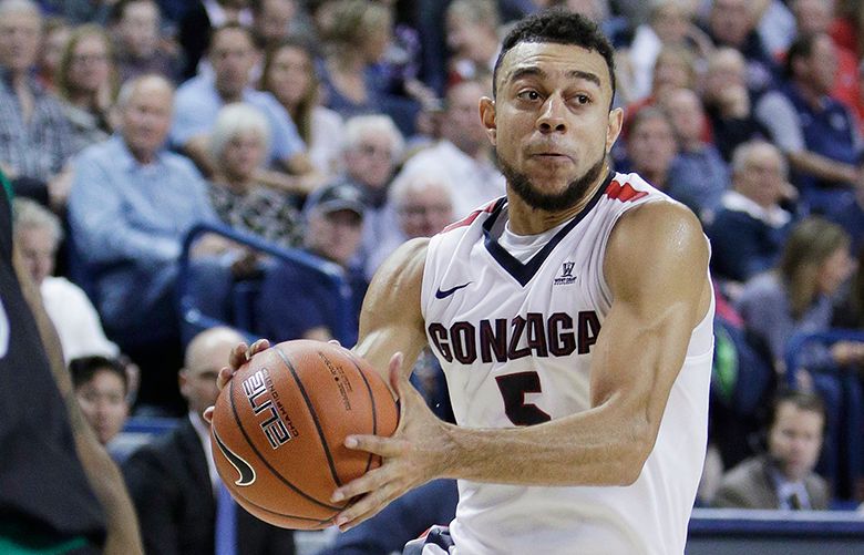 Gonzaga guard Nigel Williams-Goss (5) drives the ball during the second half of an NCAA college basketball game against Utah Valley in Spokane, Wash., Friday, Nov. 11, 2016. (AP Photo/Young Kwak) OTK