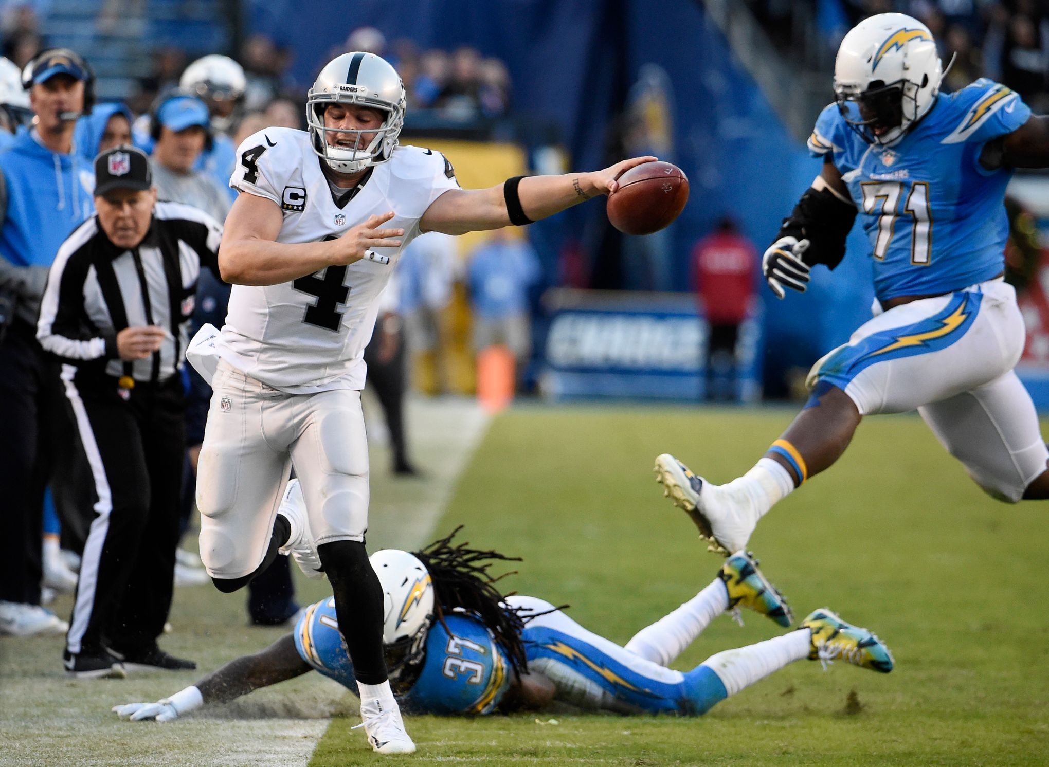 JUST WIN BABY! Las Vegas Raiders headed to the playoffs after nasty win  over Chargers