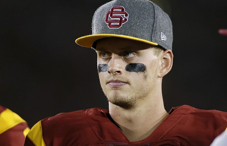 Southern California quarterback Max Browne looks on from the sidelines against Arkansas State during the first half of an NCAA college football game, Saturday, Sept. 5, 2015, in Los Angeles. (AP Photo/Danny Moloshok)