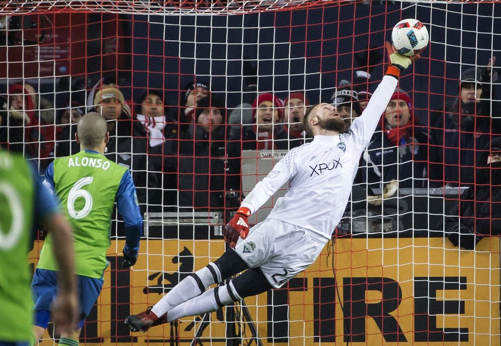 Sounders keeper Stefan Frei had a key save to help his team beat Toronto for the MLS Cup, and it was memorialized in this photo. The Sounders won only six of their first 20 matches that season. (Lindsey Wasson/Seattle Times)