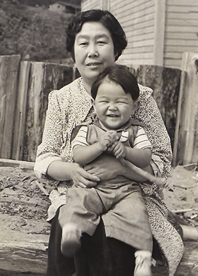 Toku Shimomura holds her grandson Roger, approximately 1942. (Roger Shimomura)