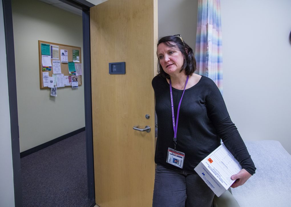 Terri Stewart, of Harborview Medical Center, is the coordinator of the Sexual Assault Nurse Examiner (SANE) program. Specially trained nurses perform the lengthy and invasive procedure that retrieves evidence from a woman’s body left by her assailant. (Steve Ringman/The Seattle Times)