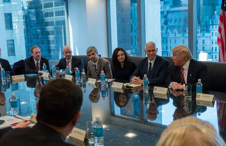 epa05675901 US President-elect Donald Trump (3-R) attends a meeting of technology chiefs in the Trump Organization conference room at Trump Tower in New York, New York, USA, 14 December 2016.  EPA/Albin Lohr-Jones / POOL