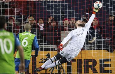 Seattle Sounders goalkeeper Stefan Frei makes a one-handed save on a shot from Toronto FC forward Jozy Altidore to keep the game tied at 0-0 during the MLS Cup at BMO Field in Toronto on Saturday, Dec. 10, 2016. 

The Sounders beat Toronto FC on penalty kicks, with the winning kick by Roman Torres, to take home their first MLS Cup title.