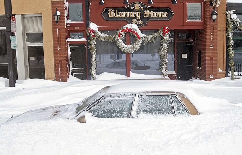 Thousands still without power after storm wallops Dakotas, Michigan ...