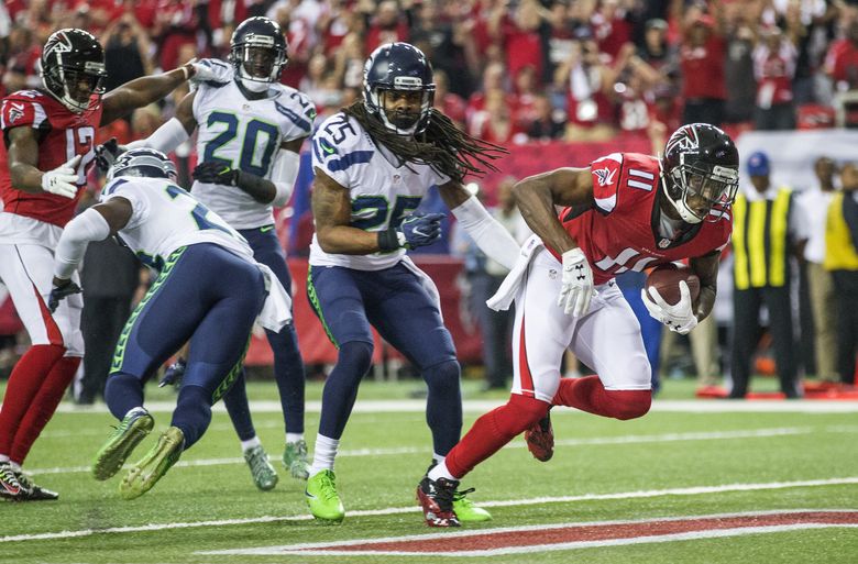 Seahawks, rocked by holding penalty, get knocked out of NFL playoffs by  Falcons