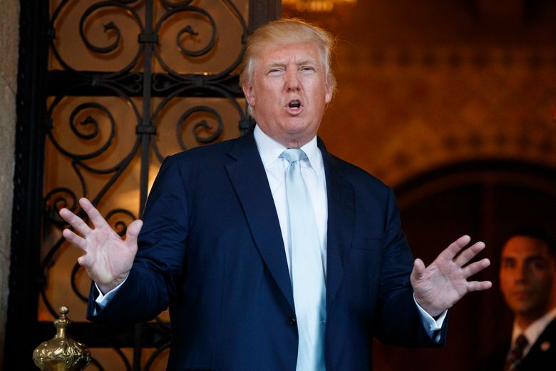 FILE – In this Dec. 28, 2016 file photo, President-elect Donald Trump speaks to reporters at Mar-a-Lago in Palm Beach, Fla. Trump challenges U.S. intelligence agencies to provide decisive evidence of Russian involvement in election-season hacking. Ahead of a highly anticipated congressional hearing, Trump is exploiting some Americans’ skepticism and undercutting officials he will soon rely on. (AP Photo/Evan Vucci, File)