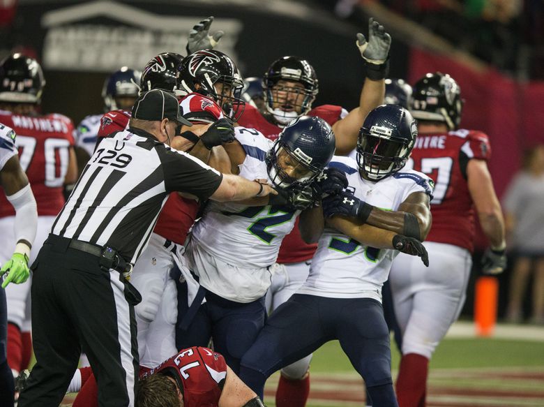 Reporter Bob Condotta grades the Seahawks' Week 3 loss to the Falcons