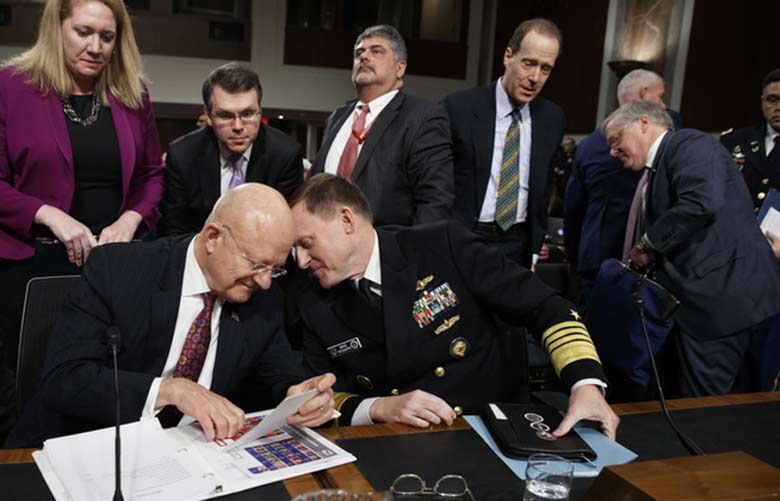 EILEEN SULLIVAN, DEB RIECHMANN | The Seattle Times