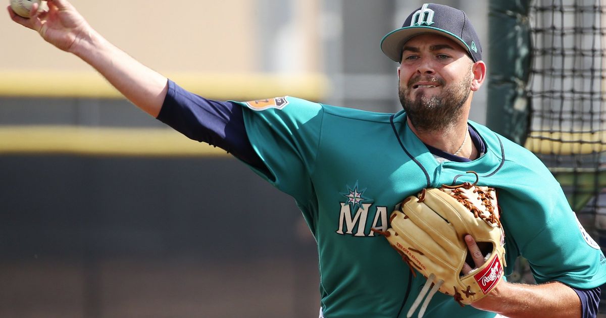 Mariners cut four pitchers from big league camp, leaning toward eight