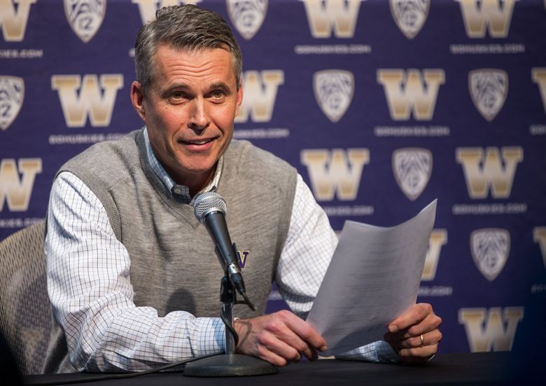 Washington football head coach Chris Petersen speaks with reporters about his list of signees on National Signing Day at Hec Edmundson Pavilion at the University of Washington on Wednesday, Feb. 1, 2017.   (Lindsey Wasson / The Seattle Times)