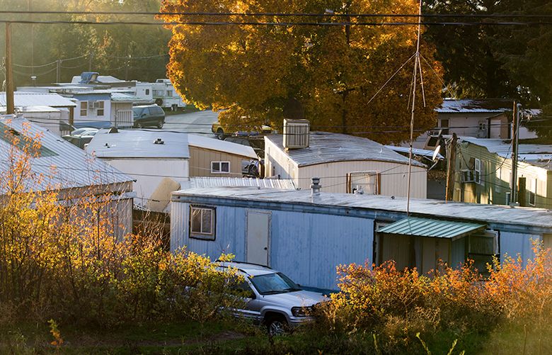 The sun sets over Shady Acres mobile home park in Ellensburg, Wash., Thursday, Oct. 27, 2016. About 100 residents live in the park. (SOFIA JARAMILLO/Yakima Herald-Republic)