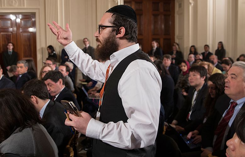Jake Turx, a Jewish reporter for Ami Magazine, asks President Donald Trump about what actions would be taken against the rise of anti-Semitism in the U.S., during a news conference in the East Room of the White House, in Washington, Feb. 16, 2017. After Trump announced R. Alexander Acosta as a replacement nominee for labor secretary, he fielded a wide range of questions from reporters there on Thursday. (Stephen Crowley/The New York Times)
