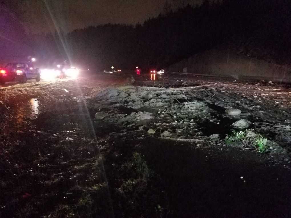 A mudslide blocked all westbound lanes of Interstate 90 in Issaquah Thursday morning. Several cars were stuck in the mud. (Washington State Patrol)