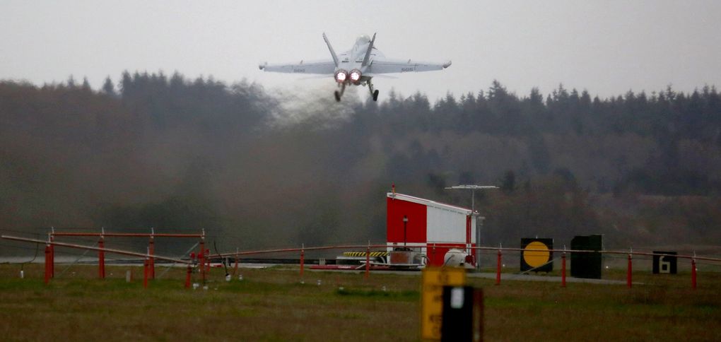 An EA-18G Growler takes off from Naval Air Station Whidbey Island during an exercise March 10, 2016. Chemicals found in aviation firefighting foam have been detected in water wells near the base’s airstrips. (Ken Lambert / The Seattle Times)