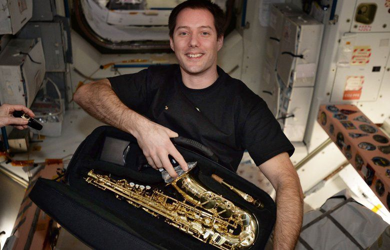 Sax in space French astronaut delighted with birthday gift The Seattle Times