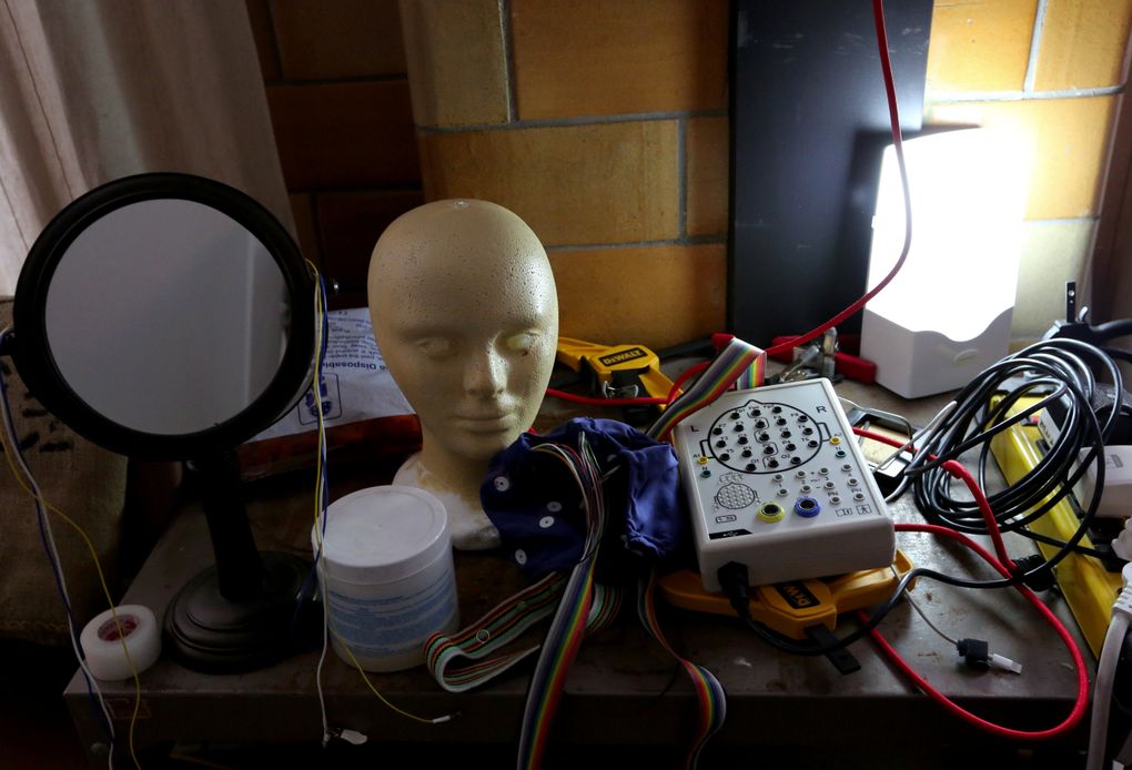 Every corner of neurologist and musician Thomas Deuel’s studio has surprises, old and new. The white electronic box connects to the electrode cap. It’s an amplifier from St. Petersburg, Russia, and when it needs repair, it’s back to St. Petersburg. (Alan Berner/The Seattle Times)