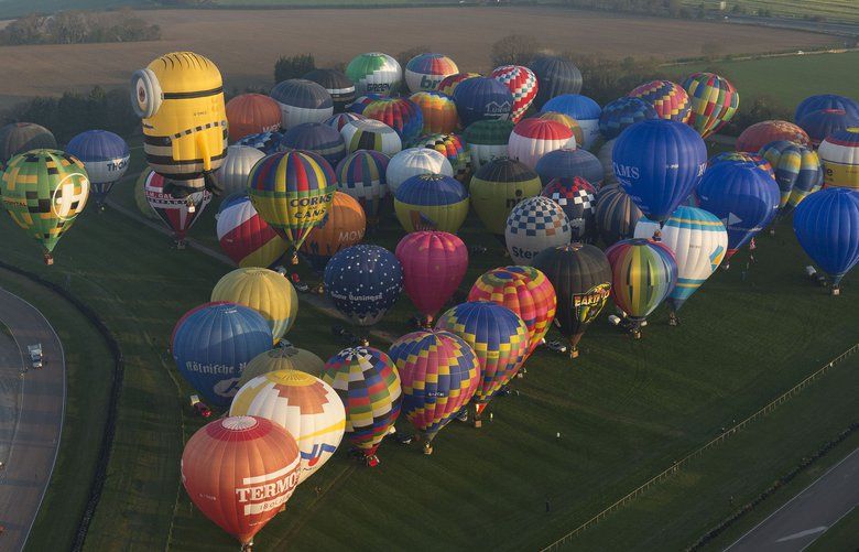 Hot-air balloons cross Channel in colorful record attempt