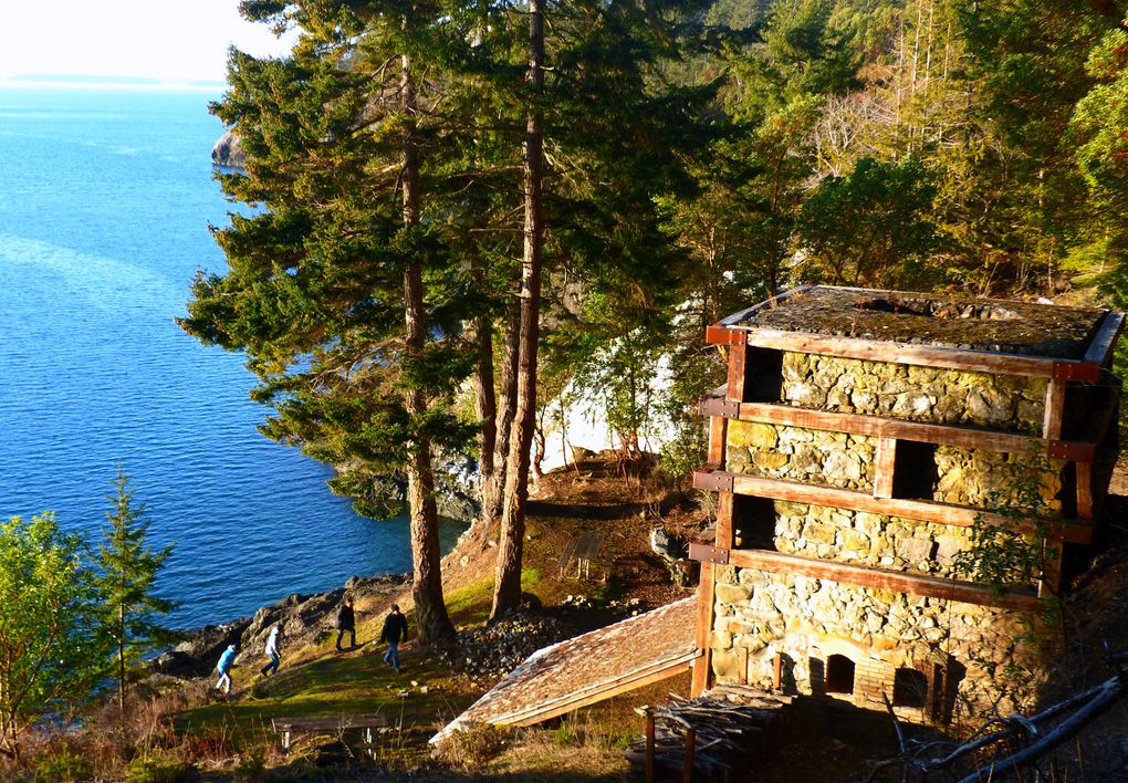 Visitors climb from the shoreline, where whales are often seen, toward a restored 19th-century lime kiln, a monument to past industry, at Lime Kiln Point State Park, on San Juan Island. (Brian J. Cantwell / The Seattle Times)