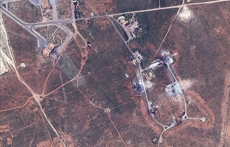 This satellite image provided by DigitalGlobe shows an image captured on April 7 of destroyed building on the southeast side of the Shayrat air base in Syria, following U.S. Tomahawk Land Attack Missile strikes on Friday, April 7, 2017 from the USS Ross (DDG 71) and USS Porter (DDG 78). The United States blasted the air base with a barrage of cruise missiles on Friday, April 7, 2017 in fiery retaliation for this week’s gruesome chemical weapons attack against civilians. (DigitalGlobe via AP)