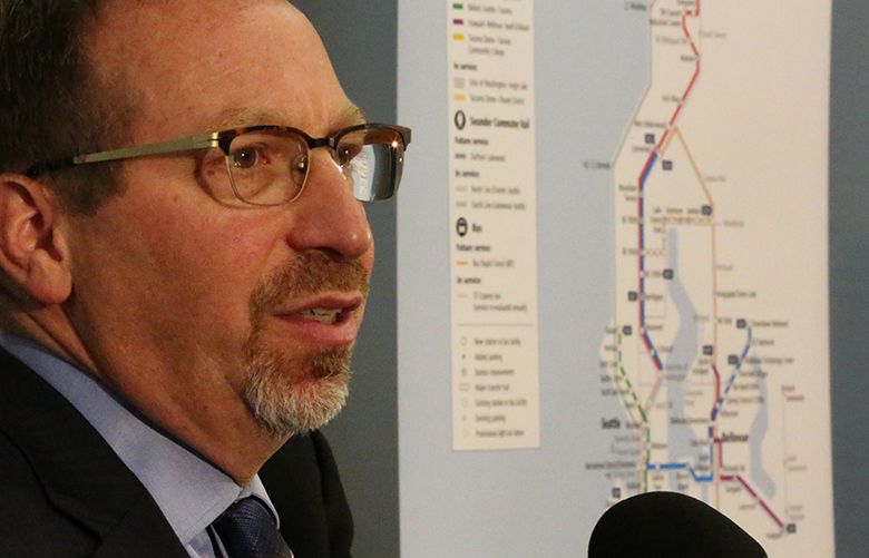 Sound Transit CEO Peter Rogoff speaks during a news conference on ST3, with a map of future Sound Transit service in the background, Thursday, April, 27, 2017, in Seattle.